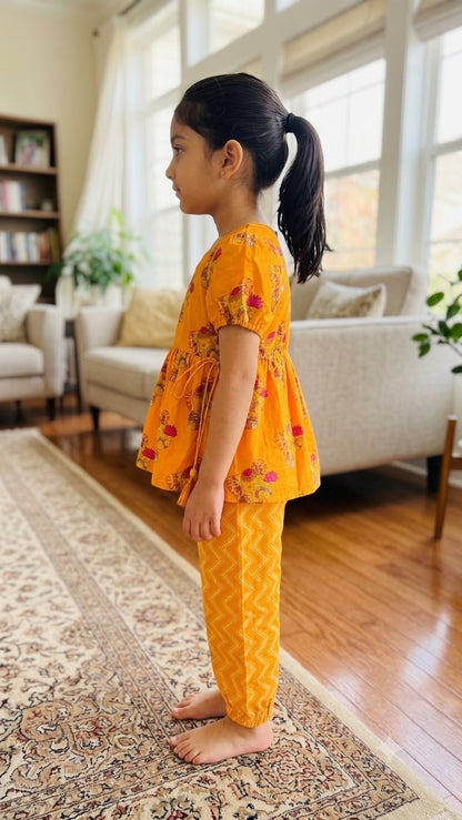 Cuddly Cubs Girls Ganesha Print Angrakha Kurti with Chevron Harem Pants Set